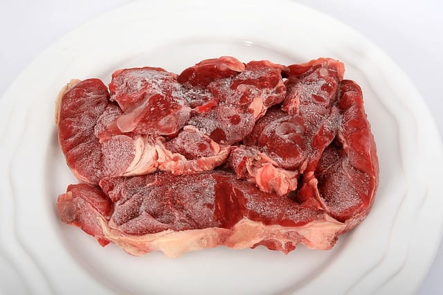 Is it safe to cook frozen meat without thawing