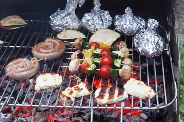 charcoal barbecue grilling with foil